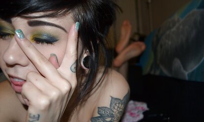 Unknown pretty tatooed woman