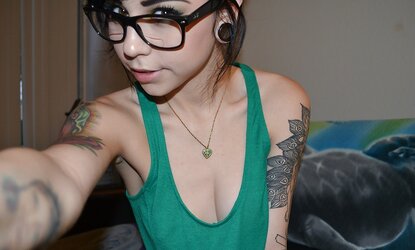 Unknown pretty tatooed woman