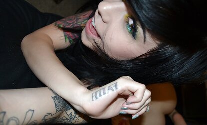 Unknown pretty tatooed woman
