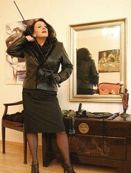 High-Heeled Slippers And Leather