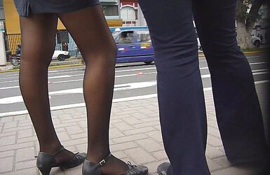 Spy Student Flight Attendant in Ebony Stockings.
