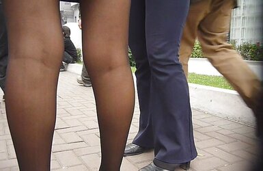 Spy Student Flight Attendant in Ebony Stockings.
