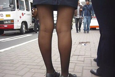 Spy Student Flight Attendant in Ebony Stockings.
