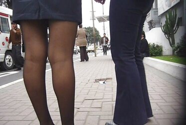 Spy Student Flight Attendant in Ebony Stockings.