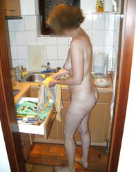 Wife with large mature backside in kitchen