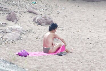 Mature on a beach in Corfu