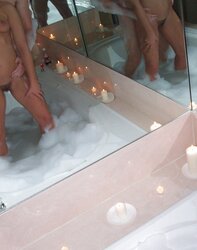 Duo having joy in the bathtub