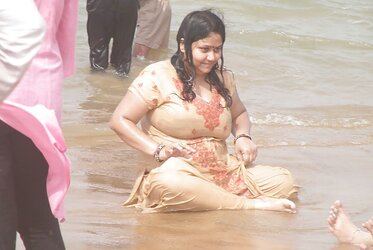 PLUMPER indian with enormous orbs at Sea Ganga