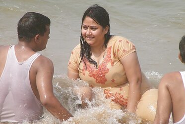 PLUMPER indian with enormous orbs at Sea Ganga