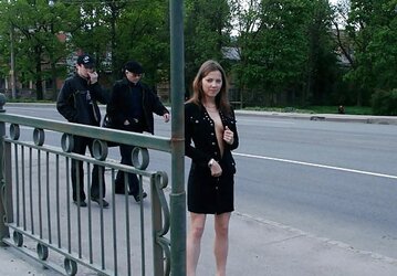 Teenager dark-haired demonstrating in the street