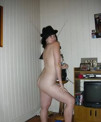 Inexperienced brown-haired wifey posing bare