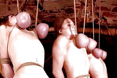 Wives suspending by their jugs