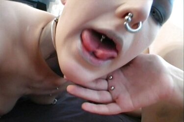 Shaven sapphic with dozen of piercings
