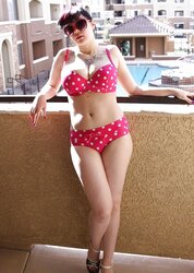 BUXOMY BATHING SUIT CHICK ON BALCONY