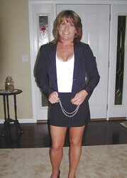 Businesswoman disrobing after work