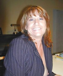 Businesswoman disrobing after work