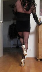 Lovely tiny high-heeled slippers and nylon chick eyeing for penis