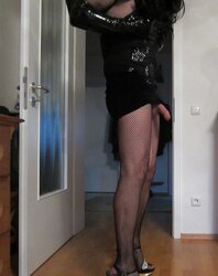 Lovely tiny high-heeled slippers and nylon chick eyeing for penis