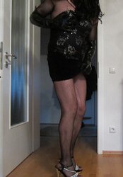 Lovely tiny high-heeled slippers and nylon chick eyeing for penis