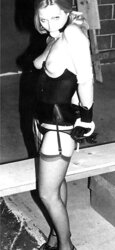 Vintage female being strapped down