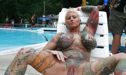Tatted huge mature exhibitionist