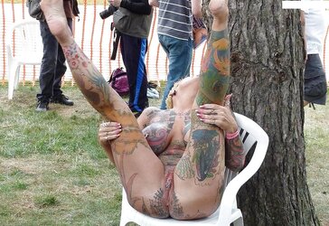 Tatted huge mature exhibitionist