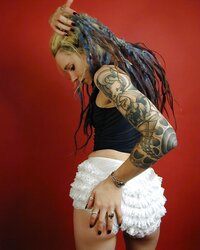 Inked goth woman