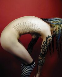 Inked goth woman