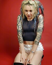 Inked goth woman