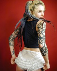 Inked goth woman