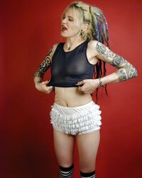 Inked goth woman