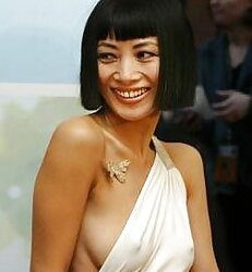 Nymphs sans brassiere under sheer half-shirt