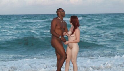 106 Multiracial duo naked on the beach