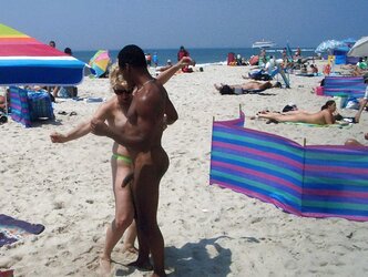 106 Multiracial duo naked on the beach