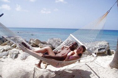 106 Multiracial duo naked on the beach