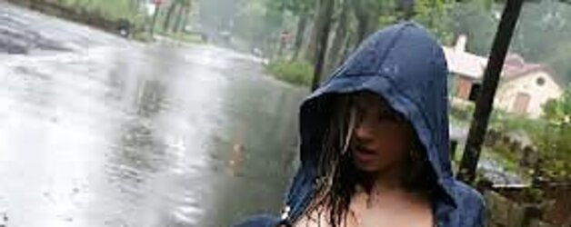 Spectacular Frankenstorm Women in rain.