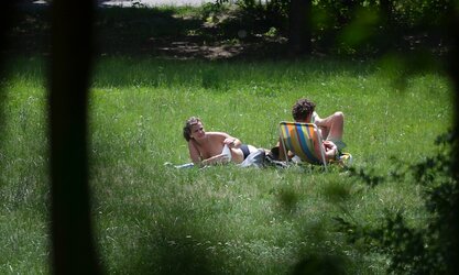 Lady sunbathing in the park I