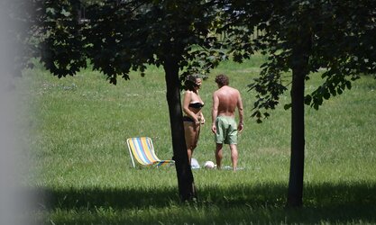 Lady sunbathing in the park I