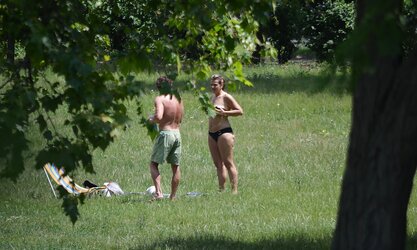 Lady sunbathing in the park I