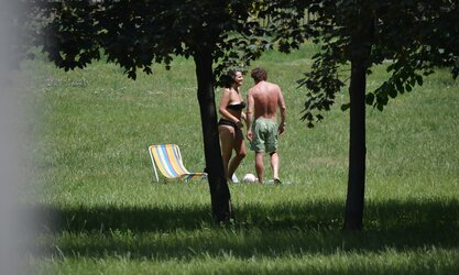 Lady sunbathing in the park I