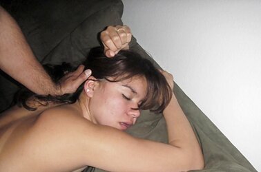 Holding Her Head As She Fellates