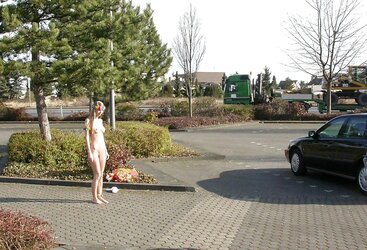 Posing bare in a public place