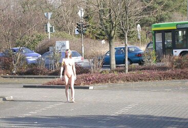 Posing bare in a public place