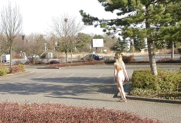 Posing bare in a public place