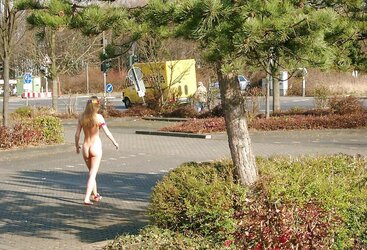 Posing bare in a public place