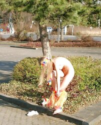 Posing bare in a public place
