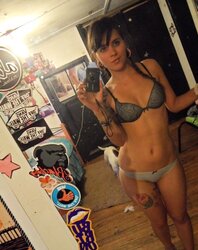 Chick with tat