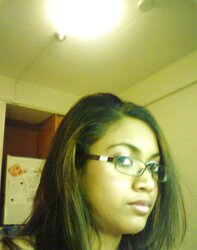 Luxurious Dark-Hued Female With Glasses