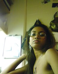 Luxurious Dark-Hued Female With Glasses