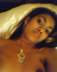 Luxurious Dark-Hued Female With Glasses